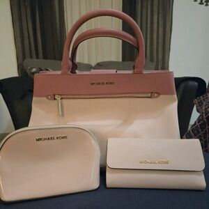 Pink Michael Kors purse with wallet and small bag